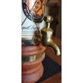 Richelieu Bottle on Tap with Wooden Features and  a Brass Tap