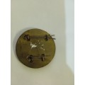 Signals badge on backing plate