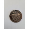 Tail Wagger club medallion