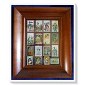 Sixteen Rare & Collectible Vintage Matchbox Covers Mounted behind Glass in Wooden Antique Frame*