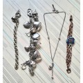 JOB LOT OF COSTUME JEWELLERIES BRACELETS WITH CHARMS AND CHAINS.