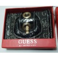 BRAND NEW `GUESS by MARCIANO` LUXURY 3 FOLD WALLET WITH LAMINATED LEATHER.
