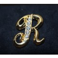 CUSTOM MADE INTIAL `R` EARRING OR PIN BROOCH WITH UNKNOWN STONES.