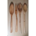 SET OF 4 BRAND NEW VERY GOOD QUALITY CARVED WOODEN CUTLERIES .