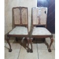 PAIR OF ANTIQUE AUTHENTIC BALL & CLAW STINKWOOD PADDED CHAIRS.