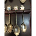 Nice wooden house spoon holder with collectable spoons. All For 1 Bid.