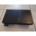 PS2 console + Accessories + Games