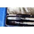 Hallmarked silver child's knife and fork set.