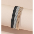 Black, Gold and Silver Stretchies - Guitar String Coil Bracelets - Set of 12