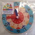 Wooden clock. Learning aid.