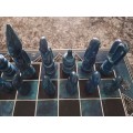 Chess set,Kenyan soapstone, 32 pieces plus board(blue king glued)