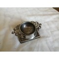 Vintage silver plated tea strainer and holder