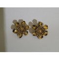Gold toned flower clipon earrings
