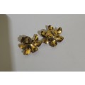 Gold toned flower clipon earrings