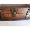 Small wooden suitcase, covered in leather