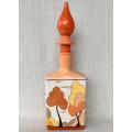PAINTED GLASS BOTTLE in a Clarice Cliff Bizarre Pattern