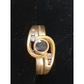 18ct yellow gold ring with blue sapphire centre stone