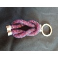 Swarovski "tie the knot" purple keyring