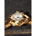 Genuine solid 18ct yellow gold with a genuine solitaire diamond ring