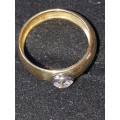18ct yelllow and white gold ring with genuine .39 carat diamond