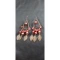 Red large dangling earrings