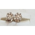 18ct white gold with 7x natural diamonds in each earring stud set