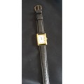 Gents watch with black leather strap