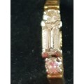 Genuine 18ct and 1/2 carat straight baguette cut Diamond Ring with 2 round cut diamond either side