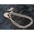 Heavy Sterling Silver bracelet with padlock and lioness charm-reduced