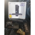 Xbox 360 E slim black console with 2 controls and Kinect in box