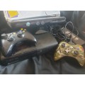 Xbox 360 E slim black console with 2 controls and Kinect in box