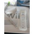 Wii console with Wii fit mat and game,1 control.1 nunchaka and Wii move dance mat