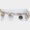 Sterling Silver cute bracelet with hearts and dolphins