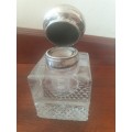Antique Solid silver and cut glass very heavy inkwell with a lions head embossed on the lid