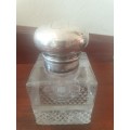 Antique Solid silver and cut glass very heavy inkwell with a lions head embossed on the lid