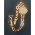 Avia ladies 17 Jewel Inca-block- solid 9ct gold watch casing and strap