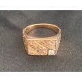 9ct gold men`s heavy gold ring with a .10 carat diamond