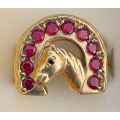 Stunning 9ct yellow gold men`s Horse shoe ring with approx 1.75 carats of ruby`s