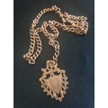 Solid Victorian Edwardian antique chain in rose gold with medallion pendant each link is stamped