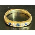 18ct yellow gold with 3 blue Sapphire`s and 2 Diamond`s