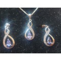 Stuuning 9ct white gold and tanzanite necklace,pendant and earring set