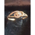 9ct dainty twirl ring with small diamond in centre