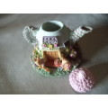 Cute Little Teapot With a family of Mice
