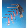 A Collection of Seven Folding Knives including 1 set of KTK Mini Knives