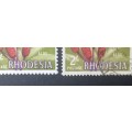 RHODESIA SACC 140-2 SHILLINGS X2 MH/USE WITH FLAW SHIFT OF FLOWER INTO MARGINS