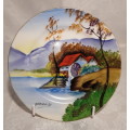 Small hand painted display plate. Wonderful country scene.