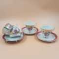 Romantic scene demitasse cups and saucers