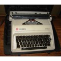 Vintage Olympia Carina 2 Typewriter in carry case-good condition working order