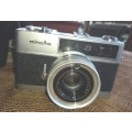 Vintage Minolta Electro Shot Camera with Rokkor-QF 1:18 F40mm lens and leather cover holder