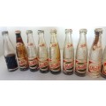 13 Vintage Pepsi Cola Minatare Bottles
